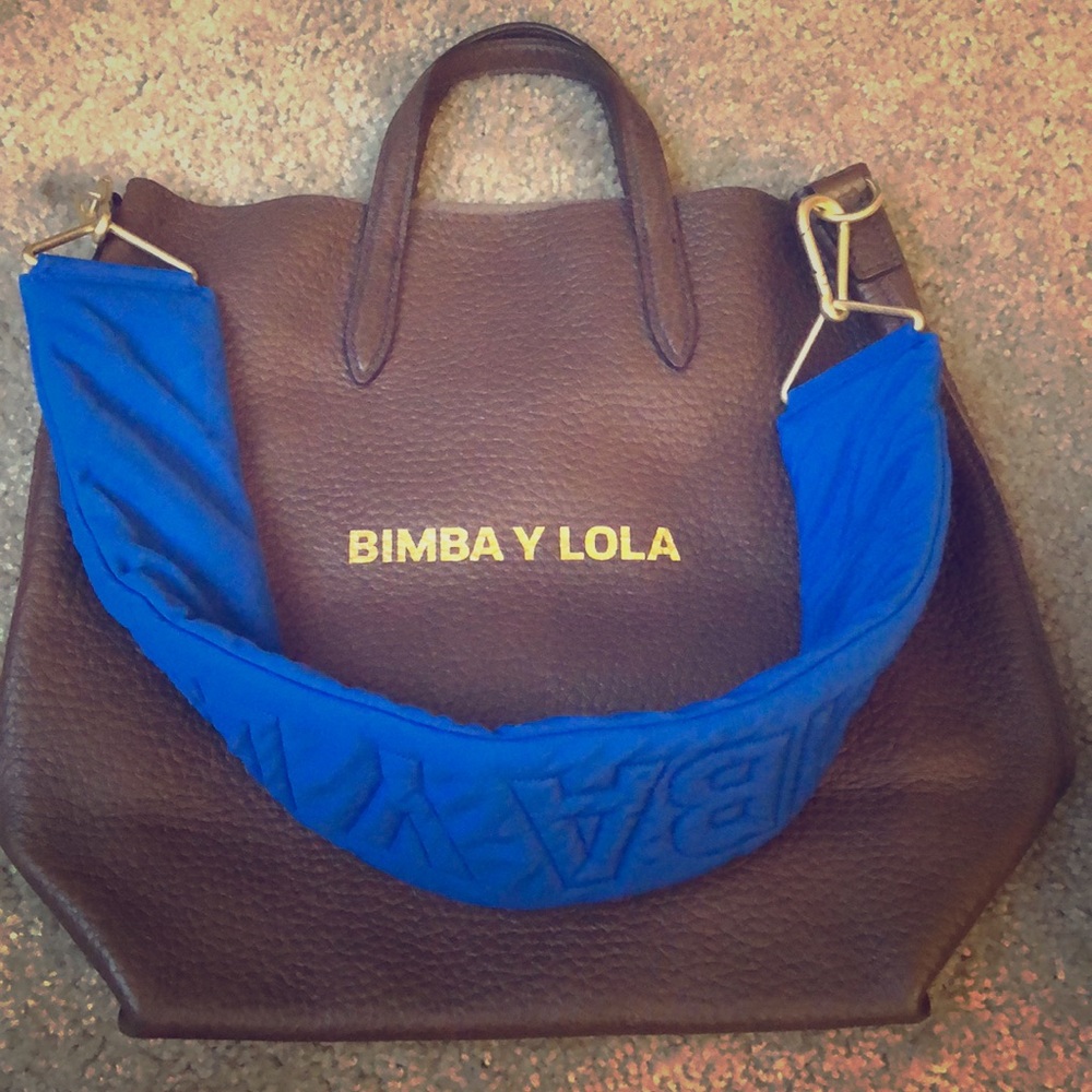 Brown leather tote with puffer strap
